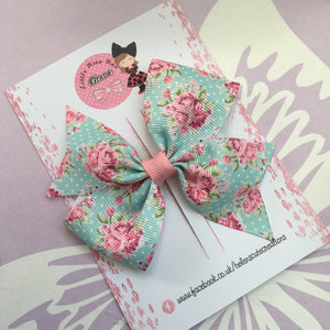 Blue and pink floral bow